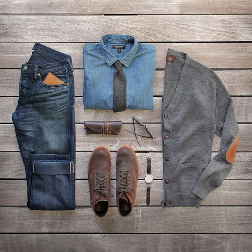 A chambray shirt outfit with a grey cardigan, dark jeans and brown boots
