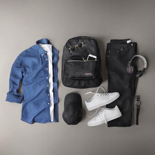 A casual chambray shirt outfit with a white T-shirt, charcoal jeans and white trainers
